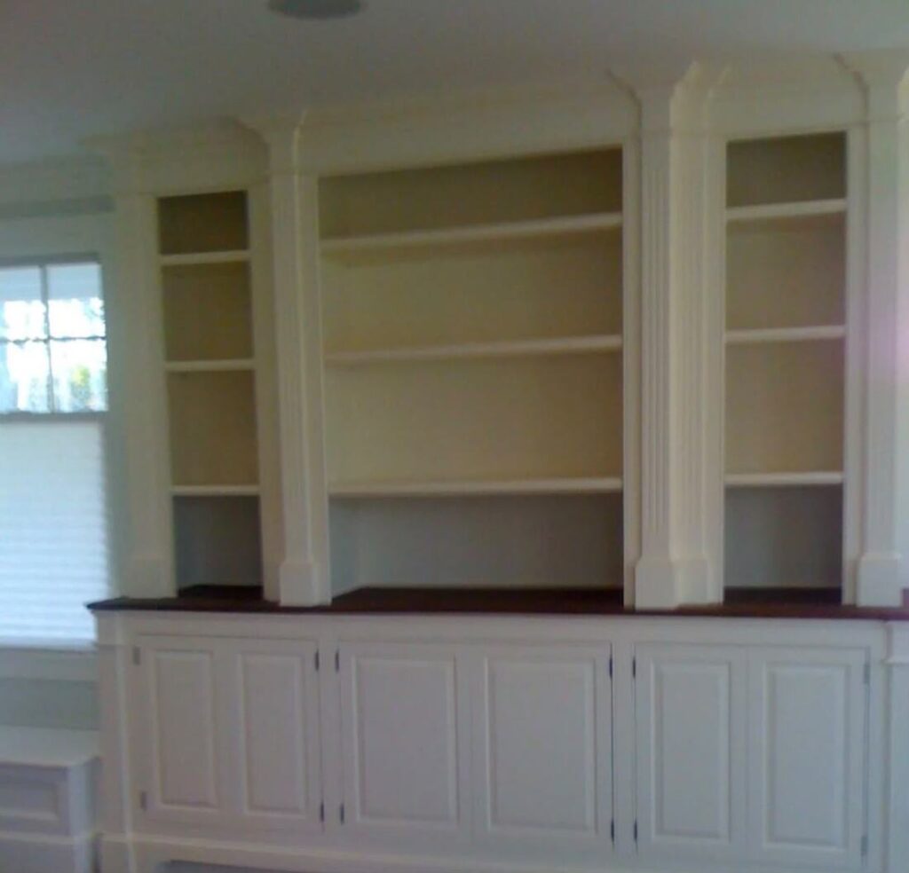 Built-in bookcase painting and finish carpentry on Cape Cod