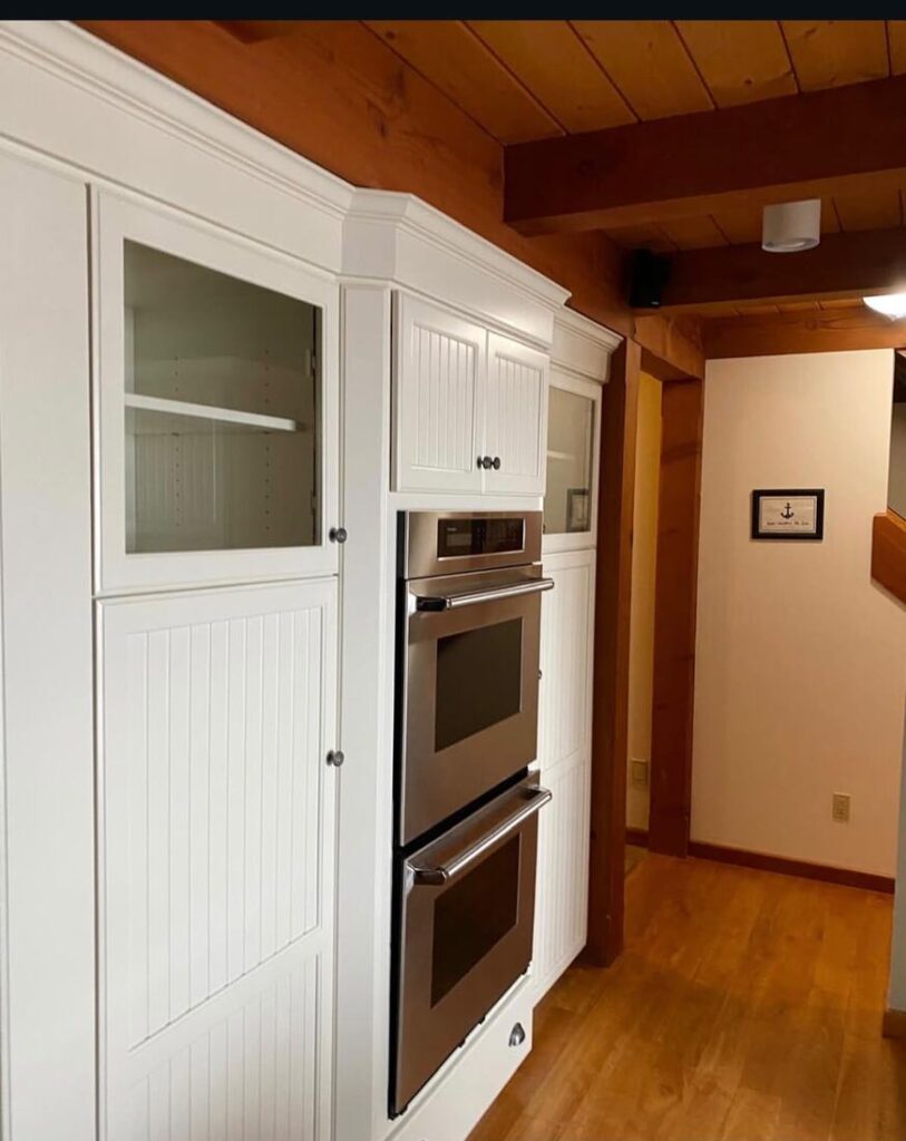 Kitchen cabinets refinished white by Marotta Painting Cape Cod